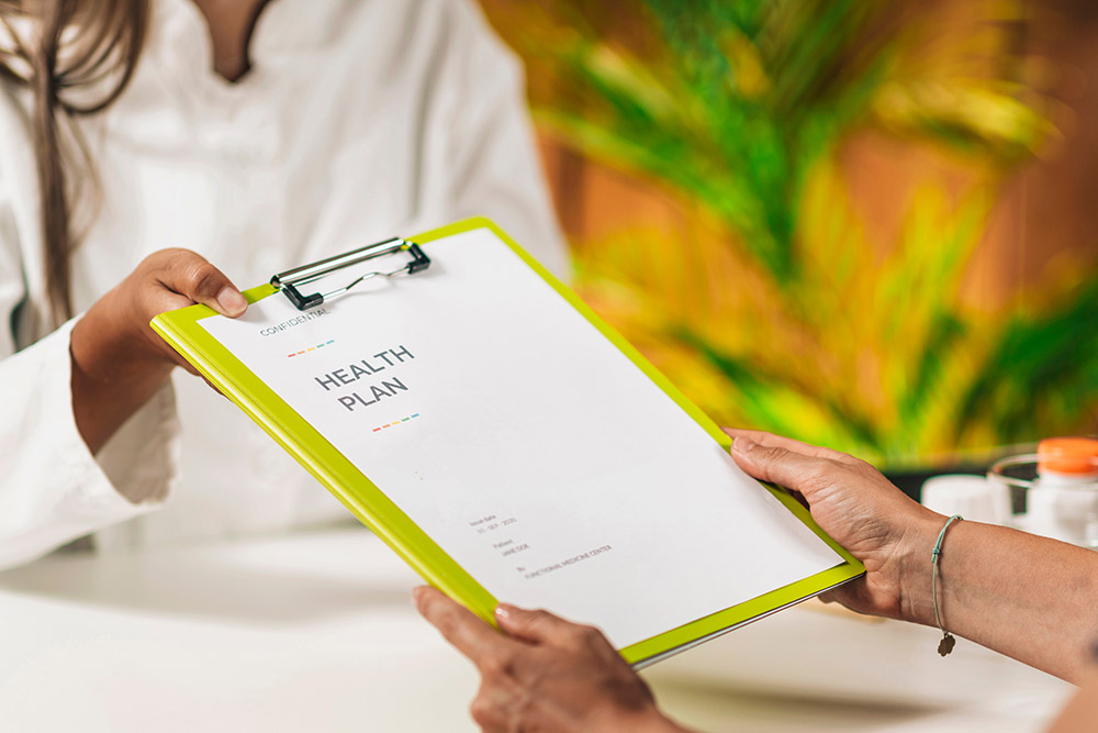 clipboard with a health plan paper on top